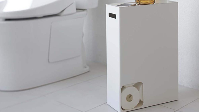 This toilet paper organizer doubles as a toilet-side table, and ensures that you and your guests will always have an extra roll within reach.